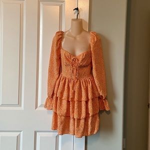 Orange floral dress. Medium. Never worn new with tags.